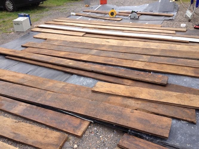 Reclaimed oak floor restoration - awaiting restoration