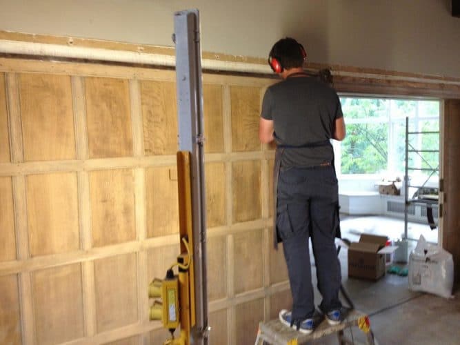 Wood panelling restoration country manor - panels stripped bare