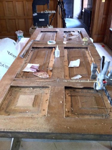 Oak door restoration - door removed and stripped