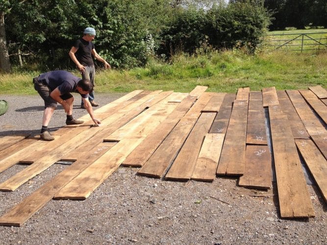 Reclaimed oak floor restoration - laid outside