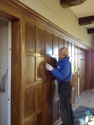 Wood panelling restoration country manor - Vincent at work