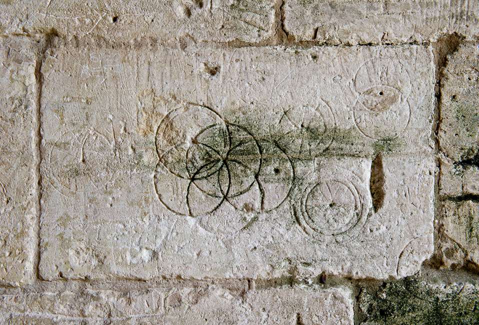 Marks found on the walls of Tithe Barn to protect crops
